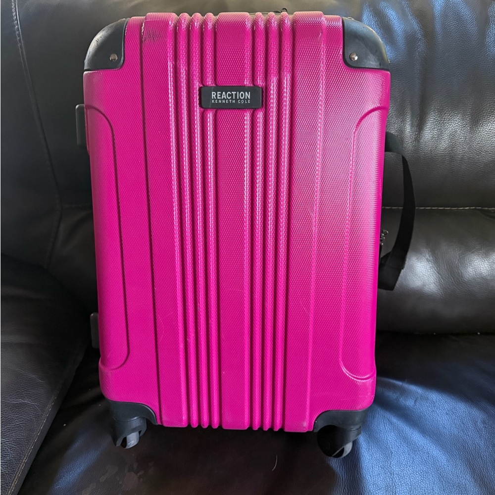 Reaction Kenneth Cole Pink Hardshell Carry-On Spinner